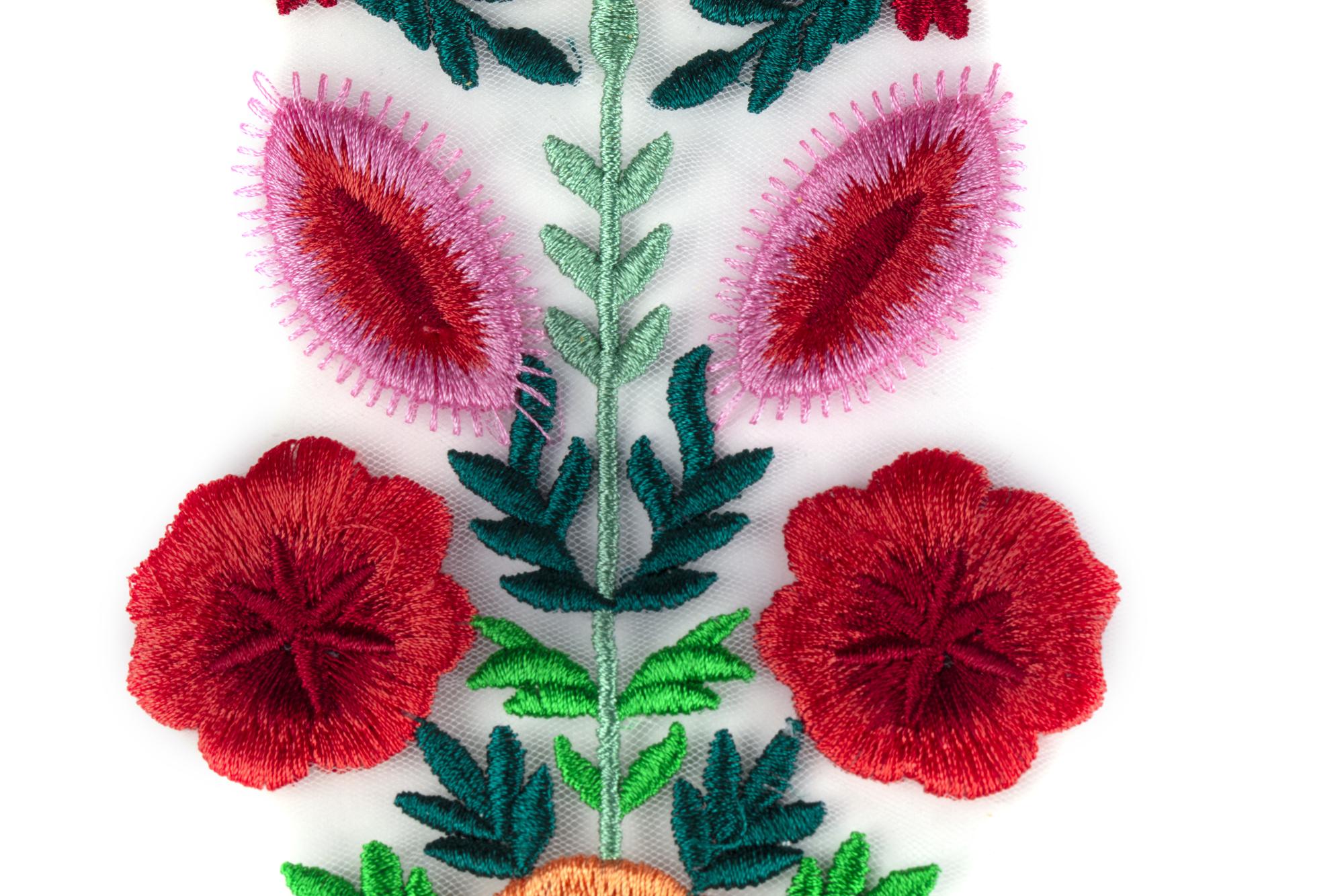Detailed floral embroidery on a garment